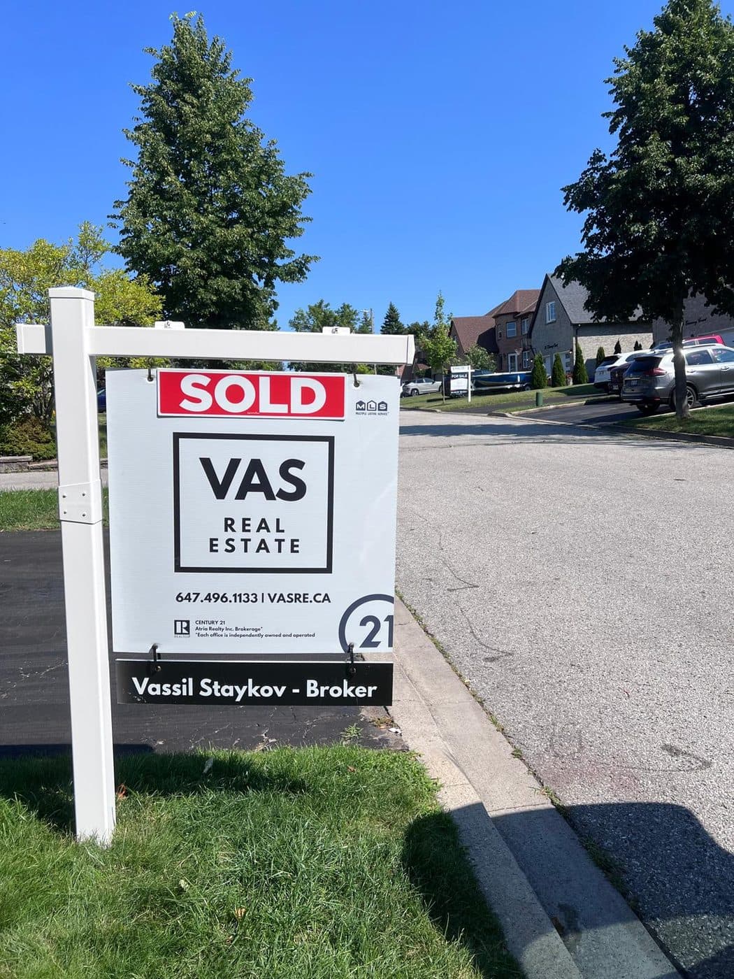 A VAS Real Estate sold sign on a Markham street