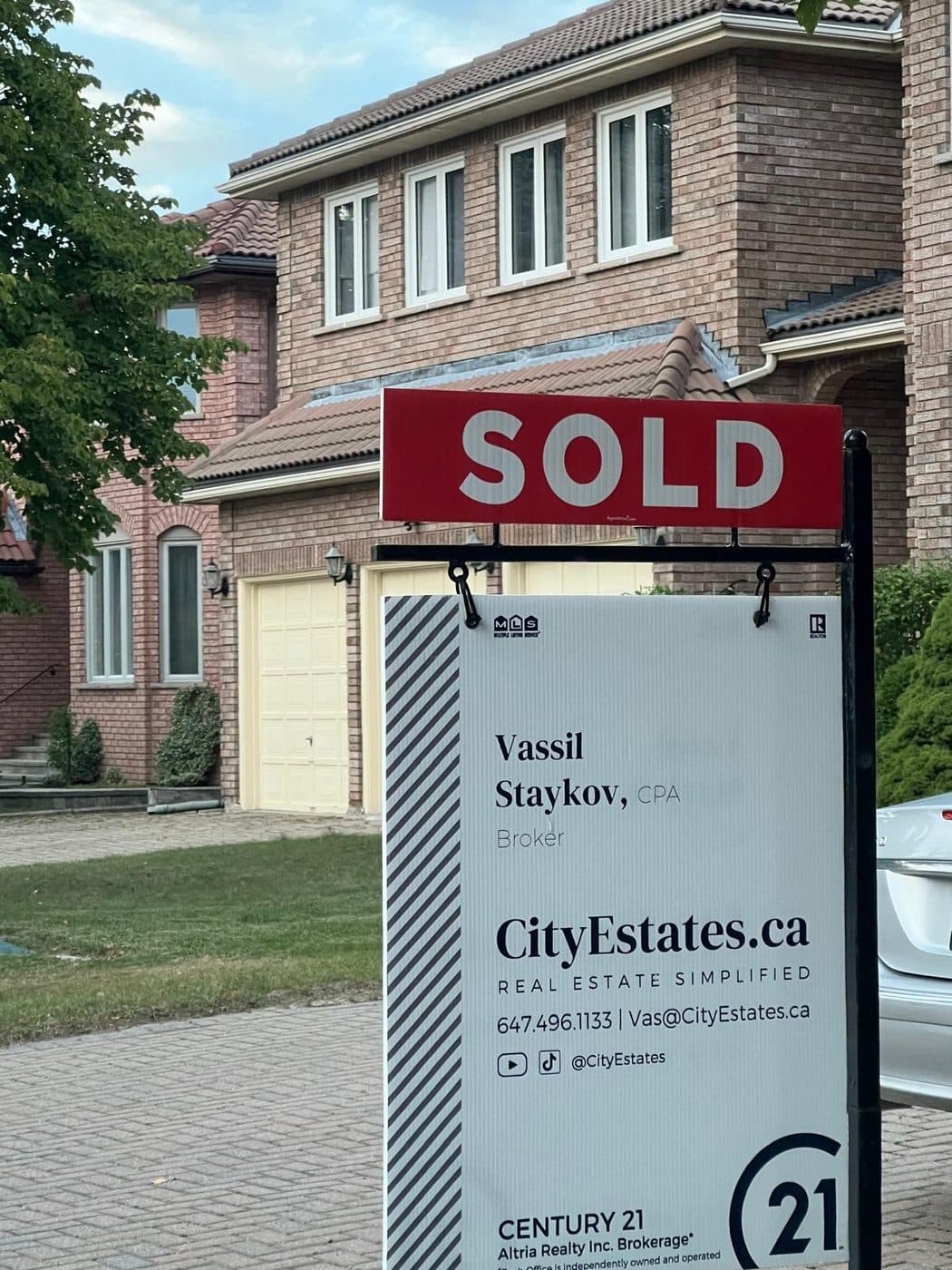 A sold sign outside a home listed by Vassil Staykov